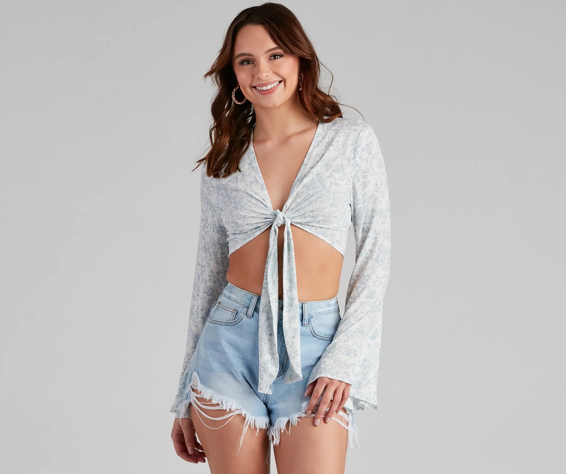 women's tops for those who want to stay on top of the latest fashion trends and wear pieces that are both stylish and on-trendSeaside Chic Cropped Tie-Front Top